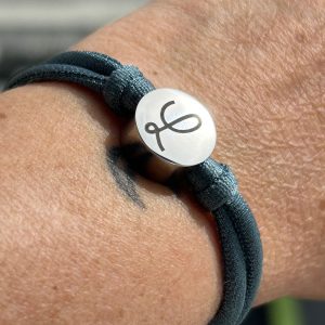 Pulsera botón de acero