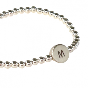 Pulsera de bolas y botones de plata