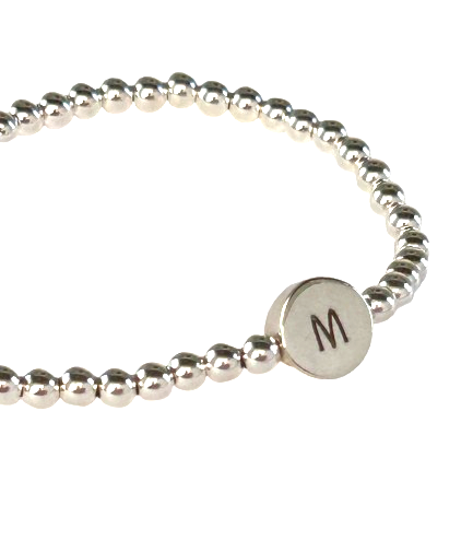 Pulsera de bolas y botones de plata